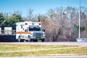 ambulance responding to accident daytime