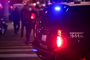 police car at night- fatal motorcycle crash 8th street Yuma