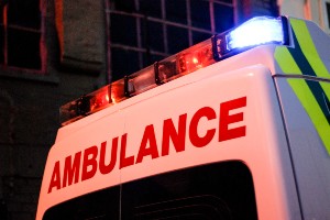 ambulance transporting three injured people