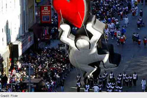 Keith Haring-inspired balloon Crashes Into NBC booth