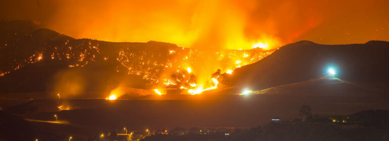 wildfire on the mountainside at night